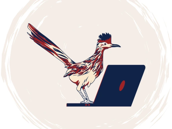 UA Blue and Red roadrunner standing on an open laptop