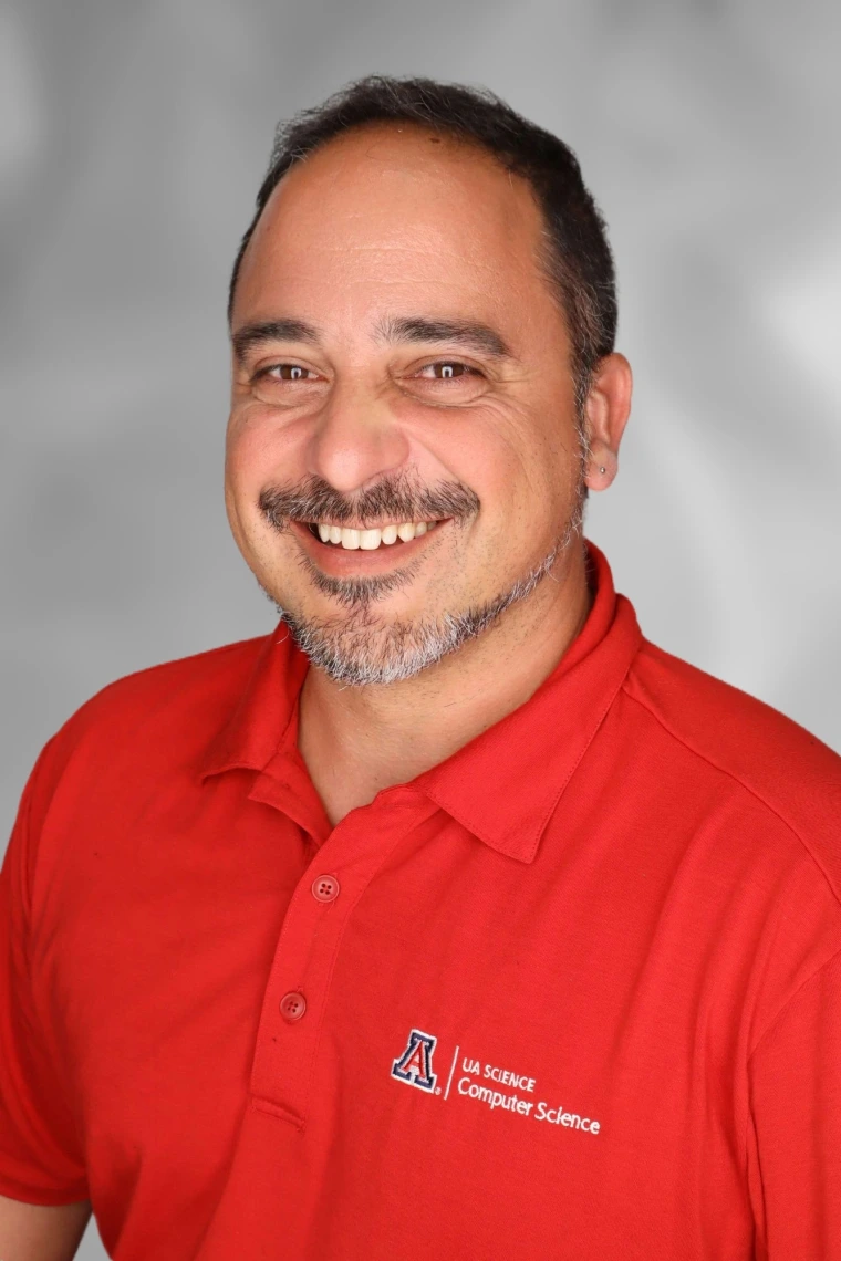 mike in a red ua cs polo